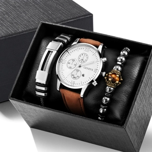 Macro detail of men's Geneva watch set with leather strap and beaded crown bracelets