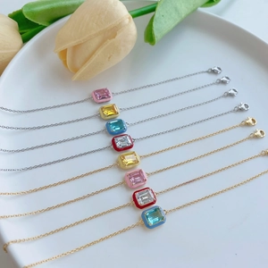 Detail view of multicolored S925 sterling silver bracelets with enamel and zircon gems
