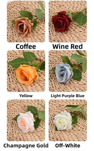 Detail of silk artificial roses in six colors including wine red and champagne gold