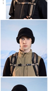 Detail of warm black knit beanie with earflaps and brim for winter outdoor activities