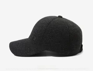 Side view of men's winter wool cap with ear protection and metal shield detail
