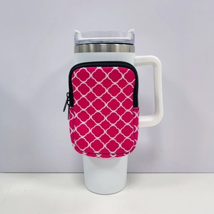 Detail view of pink clover neoprene pouch with zipper on a 40oz insulated tumbler handle