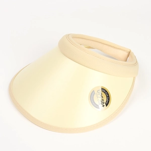 Macro detail of beige UPF50+ sun hat visor with UV protective coating and breathable knit band