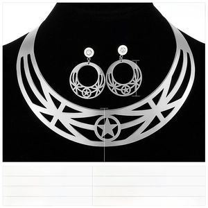 Detailed view of stainless steel collar necklace and star earrings with white rhinestones