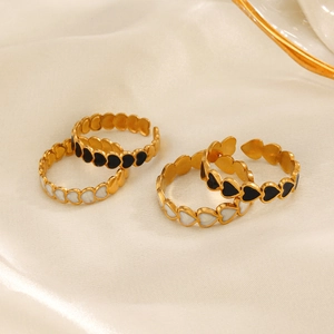 Adjustable 18K gold plated heart rings set with black enamel and white shell details