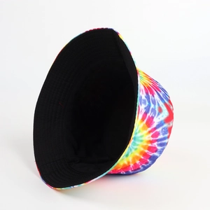 Detail of colorful tie-dye bucket hat showing vibrant 3D firework pattern and black lining