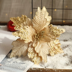Goldene Poinsettie-Weihnachtsblume mit Pailletten für festliche Dekorationen