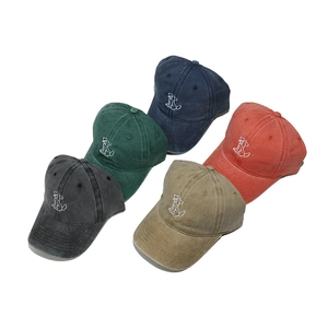 Washed cotton puppy baseball caps in dark grey, green, navy, khaki, and orange colors