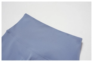 Close-up of fog blue yoga pants high waist detailing with high-quality flatlock stitching