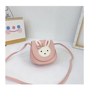 Detailed view of pink PU leather girls crossbody bag with cute rabbit applique and bow