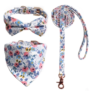 Floral pet collar set with bow tie, triangular bandana and matching leash in blue and pink