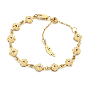 Bracciale floreale dorato con pietre blu e delicato ciondolo a piuma elegante