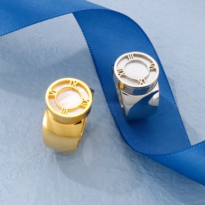 Chunky titanium steel rings with Roman numerals and mother of pearl inlay in gold and silver