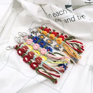 Handmade woven flower keychain charm with colorful cotton rope and elegant long tassels