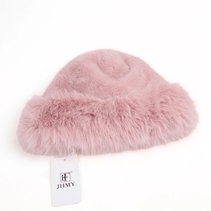 Detail of soft pink faux rabbit fur Mongolian style winter bucket hat for women.
