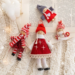 Charming four-piece Christmas tree doll set with knitted fabrics and wooden heads