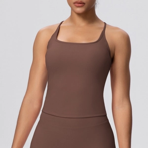 Close-up of square neckline and thin straps on a dark brown high-elastic sports bra
