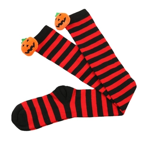 Halloween over-knee stockings with red and black stripes and 3D plush pumpkin decor