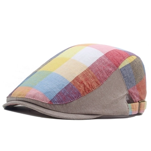 Detail of colorful plaid ivy cap featuring breathable fabric and adjustable metal strap