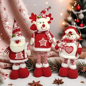 Three Christmas plush ornaments featuring Santa, reindeer and snowman on a festive background