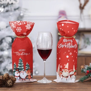 Festive Christmas wine bottle covers featuring Santa Claus and snowman cartoon designs
