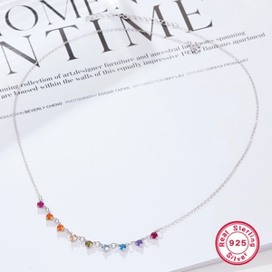 Macro detail of S925 sterling silver necklace featuring multi-color round zircon stones