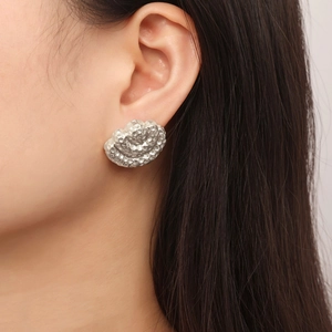 Textured silver fan-shaped stud earrings with hammered finish in a layered crescent design