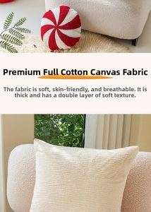 Detail of red candy-shaped pillow and white cotton canvas cushion with tufted texture