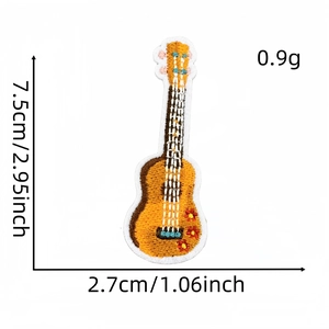 Detailed size guide of yellow guitar embroidered patch showing 7.5cm height and 2.7cm width