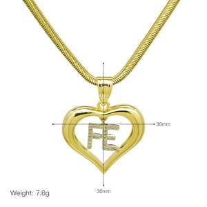 Detail of hollow heart pendant with FE letters and snake chain including size and weight specs