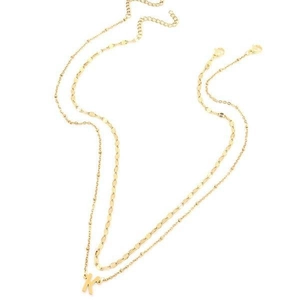 Gold layered necklace featuring bead chain with K initial pendant and flat link chain