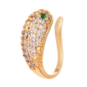 Detail of gold-plated ear cuff with pavé-set zircons and a green gemstone accent