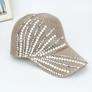 Detail of khaki mesh baseball cap featuring radiant white faux pearls and clear rhinestones