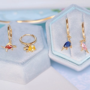 Colorful dinosaur pendant earrings with gold hoop and vibrant cubic zirconia stones