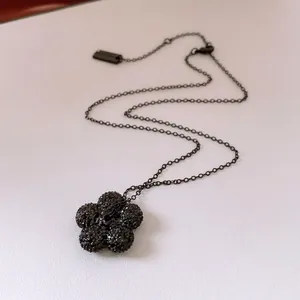 Chic black five-petal flower pendant necklace with sparkling micro-crystals for women