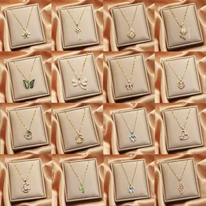 Collection of 16 gold pendant necklaces featuring rotating petals and zircon inlay designs