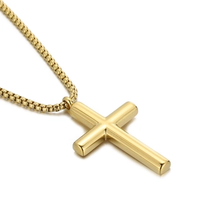 Polished gold stainless steel cross pendant necklace with box chain for men on white background