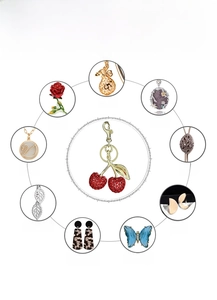 Macro display of diverse jewelry techniques including red crystal cherry keychain and cnc settings