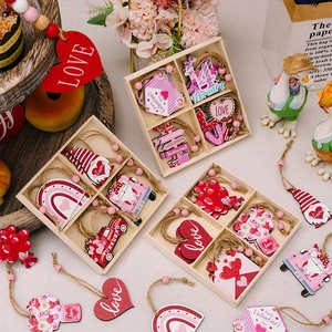 Detail of Valentine's Day pink wooden heart ornaments set with strings and beads