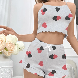 Women's two-piece heart print pajama set with camisole top and ruffled shorts in grey