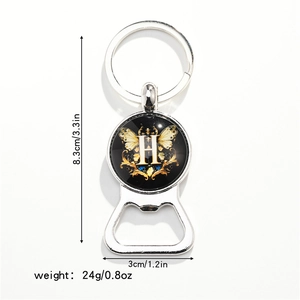 Macro shot of silver bottle opener keychain with H letter butterfly design and dimensions