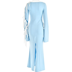 Back view of light blue long sleeve dress with white ribbon lacing and split hem detail