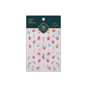 Vintage floral nail stickers with red roses and blue leaves design on white background