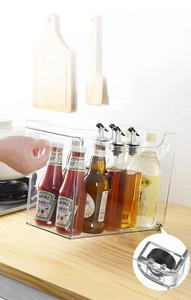Deep transparent kitchen storage bin with smooth wheels and front handle for cabinets