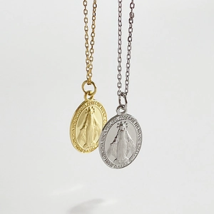 925 Sterling silver Maria pendant necklaces in gold and silver finishes on grey background