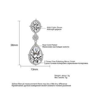 Detailed view of teardrop cubic zirconia earrings with 38mm length and gold plating