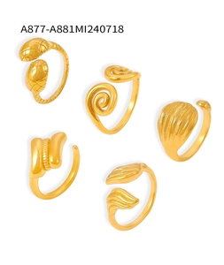 Detailed set of five gold-plated textured rings including spiral and wave patterns