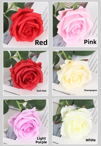 Close-up of velvet artificial roses in red pink and white for home wedding decor