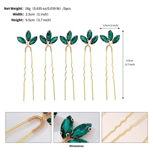 Detailed view of U-shaped hair pins with green rhinestones and size specifications