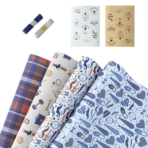Father's Day wrapping paper set with blue patterns, ribbons, and stickers on white background